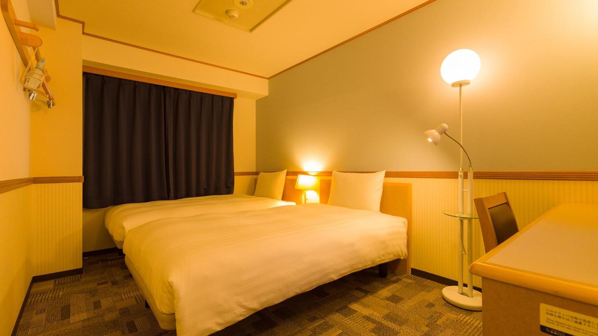 Toyoko Inn Tsuruga Ekimae Rum bild